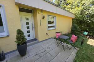 Sonnige Terrassenwohnung mit Garten, großer Terrasse und Garage