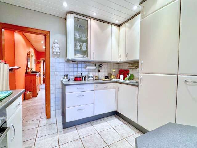 Immobilie in Lohe-Rickelshof - Ihr Haus in Lohe-Rickelshof: ebenerdiger Satteldach-Bungalow mit Einliegerwhg. in ruhiger Lage - Bild 3