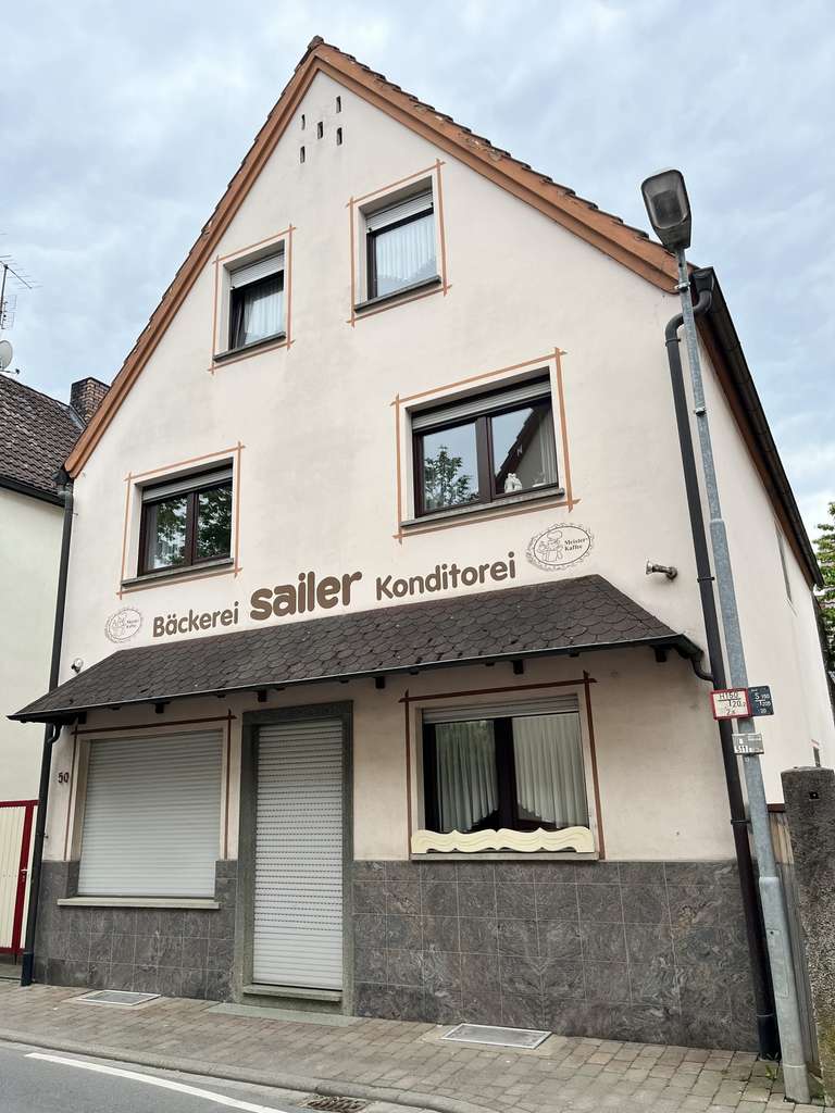 Immobilie in Lauda-Königshofen - Charmantes Einfamilienhaus mit ehemaliger Ladeneinheit, Atelier & Freisitz in Gerlachsheim - Bild 1