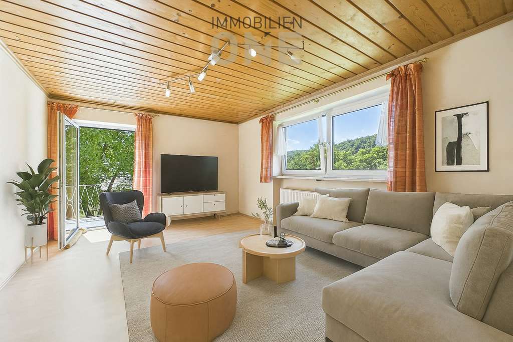 Immobilie in Nittendorf - 4-Zimmerwohnung mit Südbalkon und Einzelgarage - Bild 0