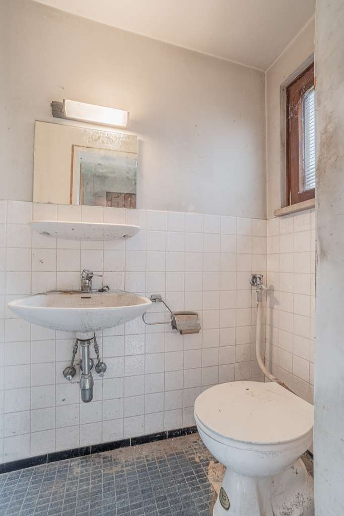 Immobilie in Aschheim - Stark renovierungsbedürftige Doppelhaushälfte in Aschheim - Bild 4