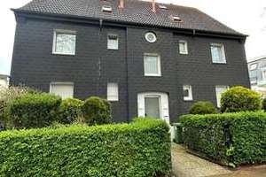 Boutique-Boutique-Mehrfamilienhaus mit renovierter und separater 4-Zimmer-Gartenwohnung.