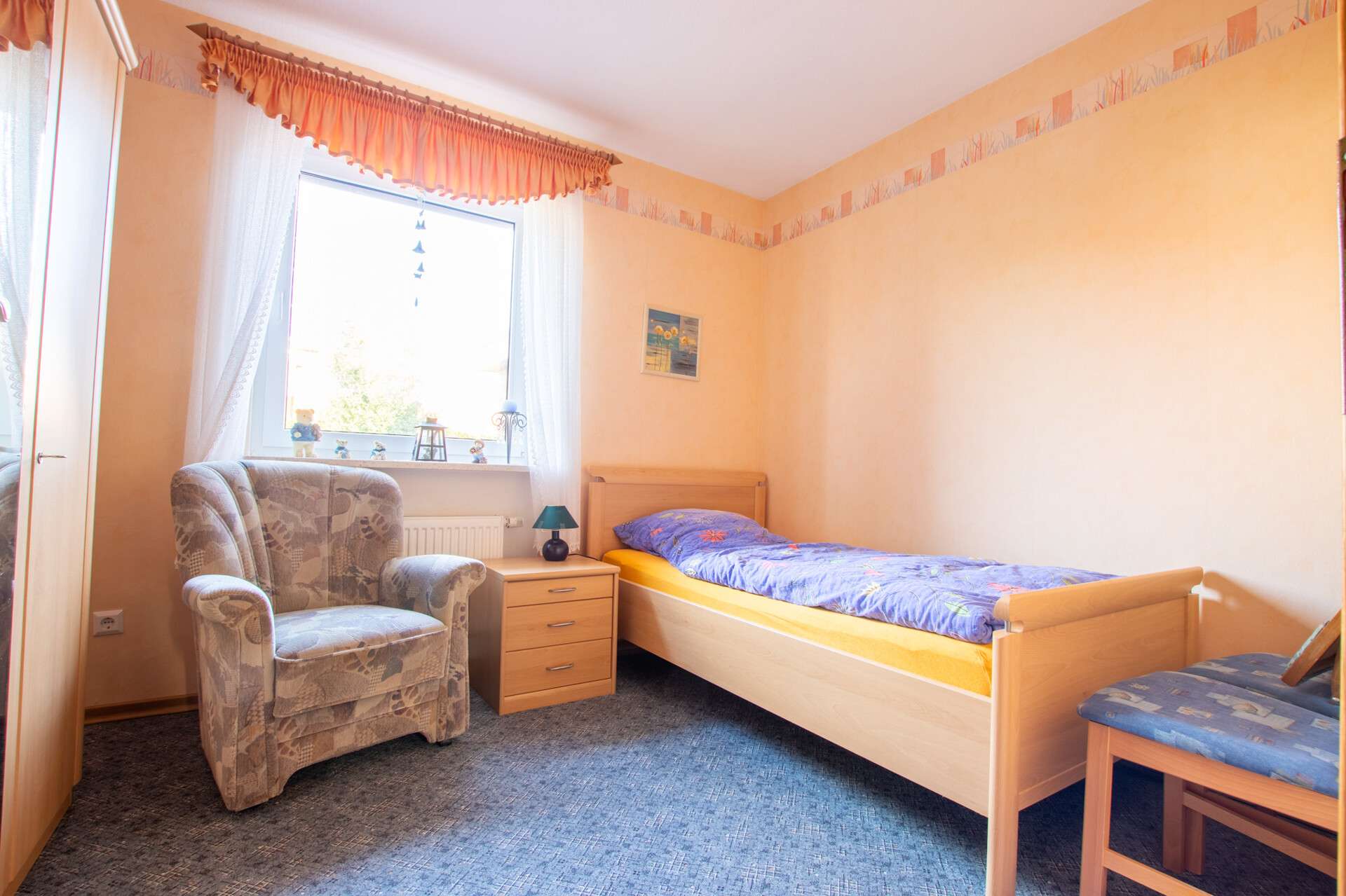 Immobilie in Westerholt - Gepflegter Bungalow in Ostfriesland mit Garage und Garten - Bild 1