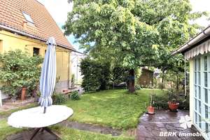 BERK Immobilien – Wohnen mit Urlaubsfeeling: Gemütliches Einfamilienhaus mit idyllischem Garten in W – 63939 Wörth am Main – Vorschaubild 2