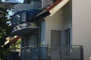 Modernisierte 1-Raum-Wohnung mit Balkon und Einbauküche in Schönaich