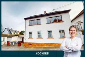 Gepflegtes Einfamilienhaus mit Hof, Terrasse und Garage zum Kauf in Münster-Sarmsheim