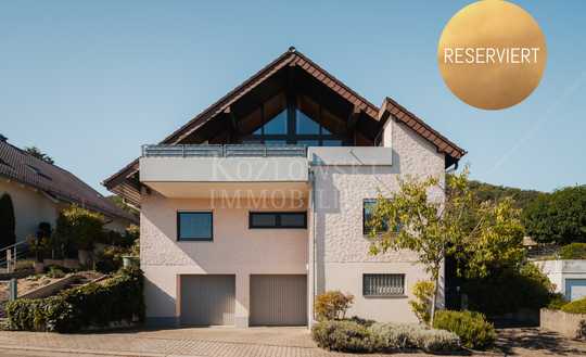 In begehrter Aussichtslage - Familienklassiker mit Sonnengarten und D-Garage!