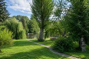 Idyllische Villa auf traumhaften Wassergrundstück am Hubertussee – Die vollständige Adresse der Immobilie erhältst du vom Anbieter., 12589 Rahnsdorf, Berlin – Vorschaubild 1
