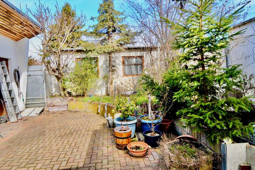 Immobilie in Dessau-Roßlau - Platz für Ihre Wohnträume - Doppelhaushälfte mit Garagen, Werkstatt  & Ausbaupotenzial - Bild 4