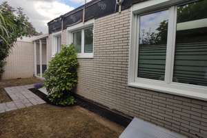 DESIGN-BUNGALOW MIT EXKLUSIVEM WINTERGARTEN, WÄRMEPUMPE & WOHNGESUNDEM RAUMKLIMA