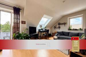 Helle und gepflegte Dachgeschoss-Wohnung mit Balkon und Einbauküche sowie TG-Stellplatz