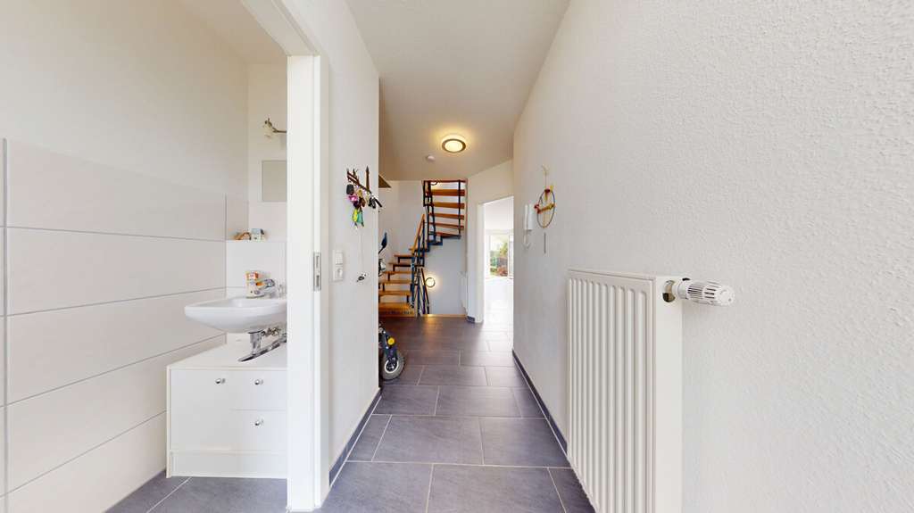 Immobilie in Kenzingen - Reihenmittelhaus in ruhiger Stichstraße mit super günstigen Verbrauchswerten in Kenzingen - Bild 1