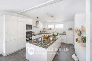 Exklusive Penthouse-Maisonette mit Dachterrasse & Stellplatz in Frankfurt-Preungeshei