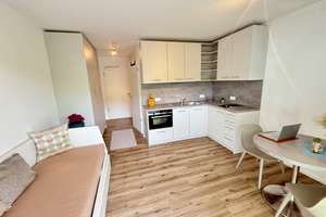 Hochwertig möbliertes Neubau-Terrassen-Apartment mit TG-Einzelstellplatz inkl. E-Ladestation
