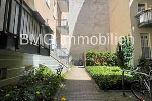 Mitten im Großstadttrubel UND absolute Ruhe: Maisonette , 2 Zimmer, EBK, Duschbad, 2 Balkone, Ke