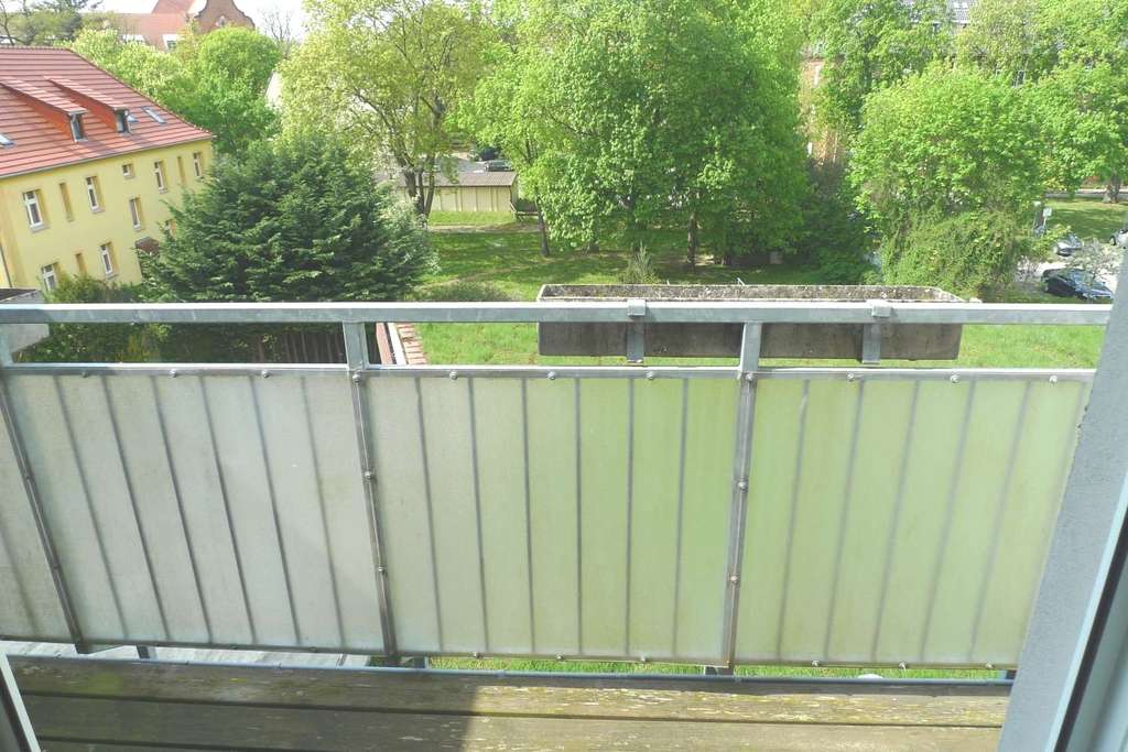 Immobilie in Neuruppin - Vermietete 3-Zimmer-Eigentumswohnung mit Balkon in zentraler Innenstadtlage - Bild 1