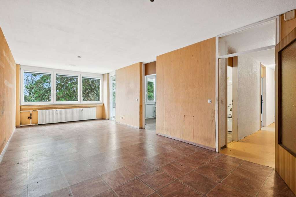 Immobilie in Unterhaching - Lichtdurchflutete 3-Zimmer-Wohnung mit viel Potential in ruhiger Lage - Bild 1