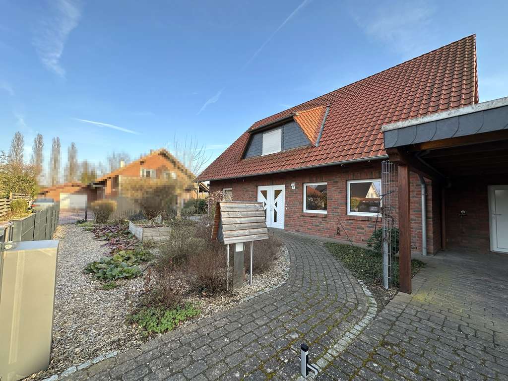 Immobilie in Ribbesbüttel - Gepflegtes Einfamilienhaus am Feldrand von Vollbüttel - Bild 0