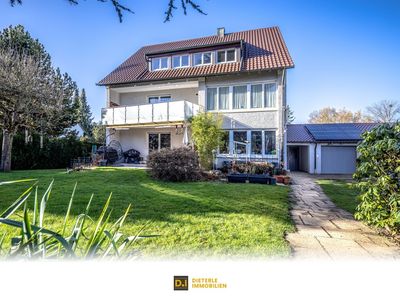 Für Kapitalanleger in bevorzugter Lage: Dreifamilienhaus mit großem und ebenem Garten