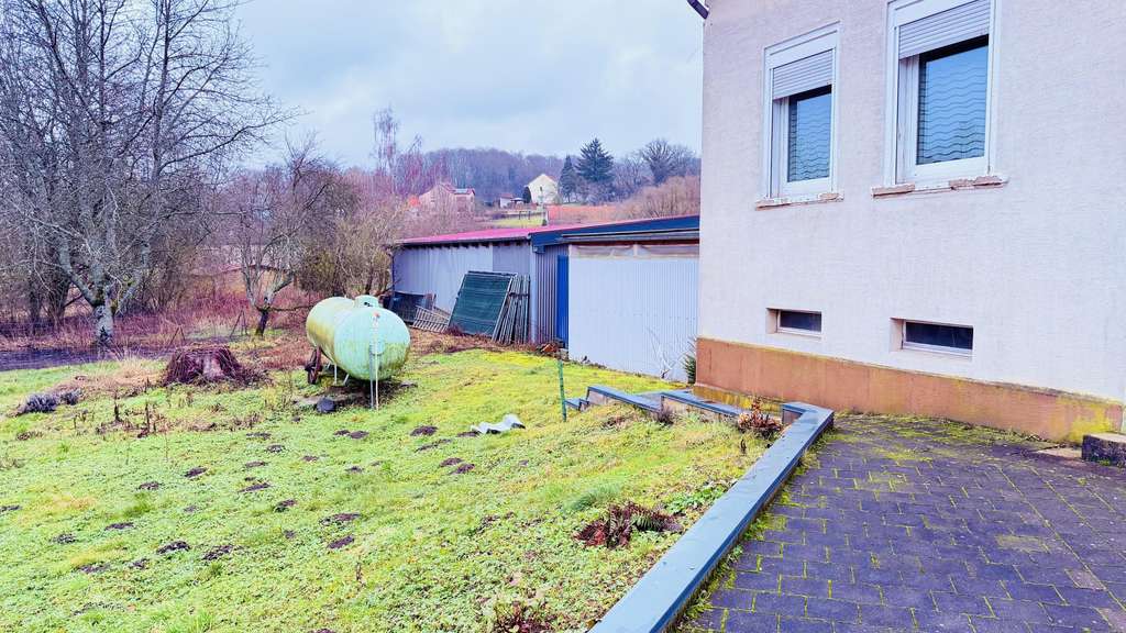 Immobilie in Sankt Wendel - Familienfreundliches Zuhause mit Ausbauoption und großem Garten! - Bild 1