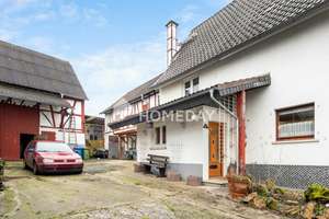 Einfamilienhaus mit Scheune und Nebengebäuden in ruhiger Lage – Die vollständige Adresse der Immobilie erhältst du vom Anbieter., 35410 Hungen – Vorschaubild 2