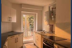 Attraktive 2-Zimmer-Wohnung mit ca. 60,50 m² Neuer Einbauküche und Balkon zum Garten
