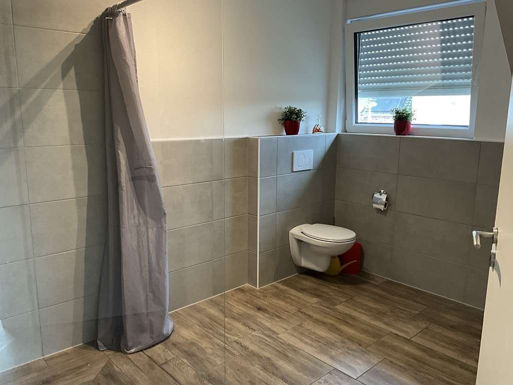 Immobilie in Rhede (Ems) - Neuwertig mit guter Rendite - Bild 3