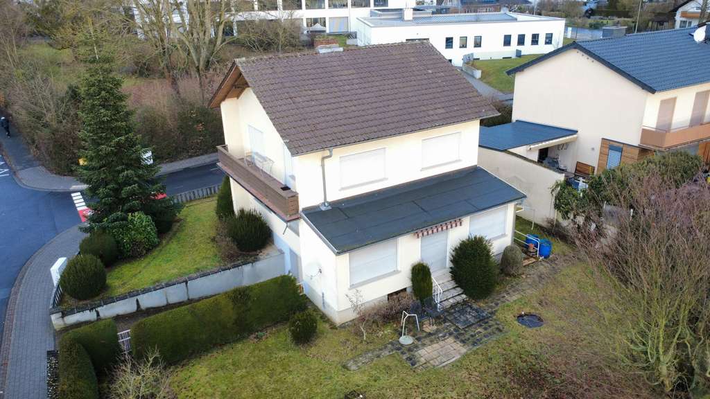 Immobilie in Lich - Einfamilienhaus mit großem Garten – Raum für Familie, Ideen und Zukunft - Bild 3