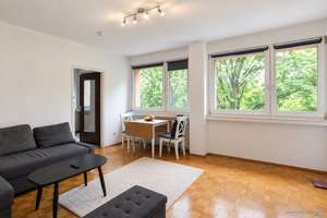 GEORGI: Bezugsfreies 1-Zimmer-Apartment in München – helle Wohnküche, Aufzug & eigener TG-Stellplatz