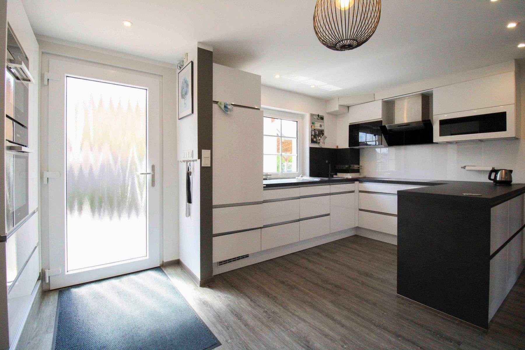 Immobilie in Tribsees - Modernisierte Doppelhaushälfte mit Anbau, Photovoltaik und schönem Garten in Tribsees - Bild 2