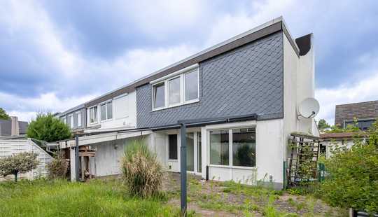 Bild von Reihenendhaus mit Potenzial, Kamin, Südterrasse & Garage in zentraler Lage von Stuhr-Brinkum