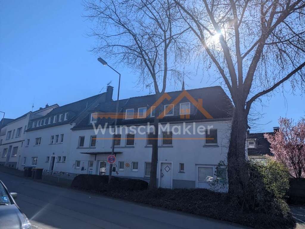 Immobilie in Menden - Vielseitiges Wohn- und Geschäftshaus in Menden – Ideale Investitionsmöglichkeit! - Bild 0