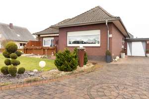 "Idyllisches Wohnen im Herzen von Badbergen: Charmanter Bungalow mit Ausbaureserve" – Eschstraße 6, 49635 Badbergen – Vorschaubild 1