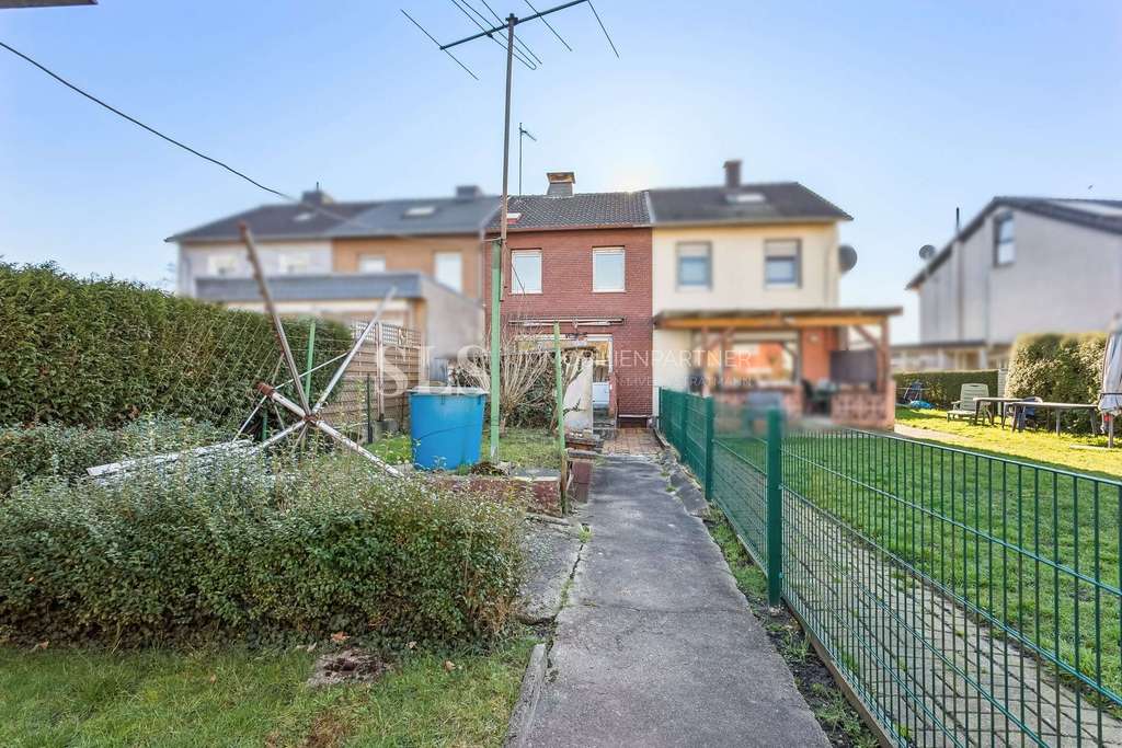 Immobilie in Waltrop - Reihenmittelhaus mit großem Entwicklungspotenzial in ruhiger Wohnlage - Bild 0