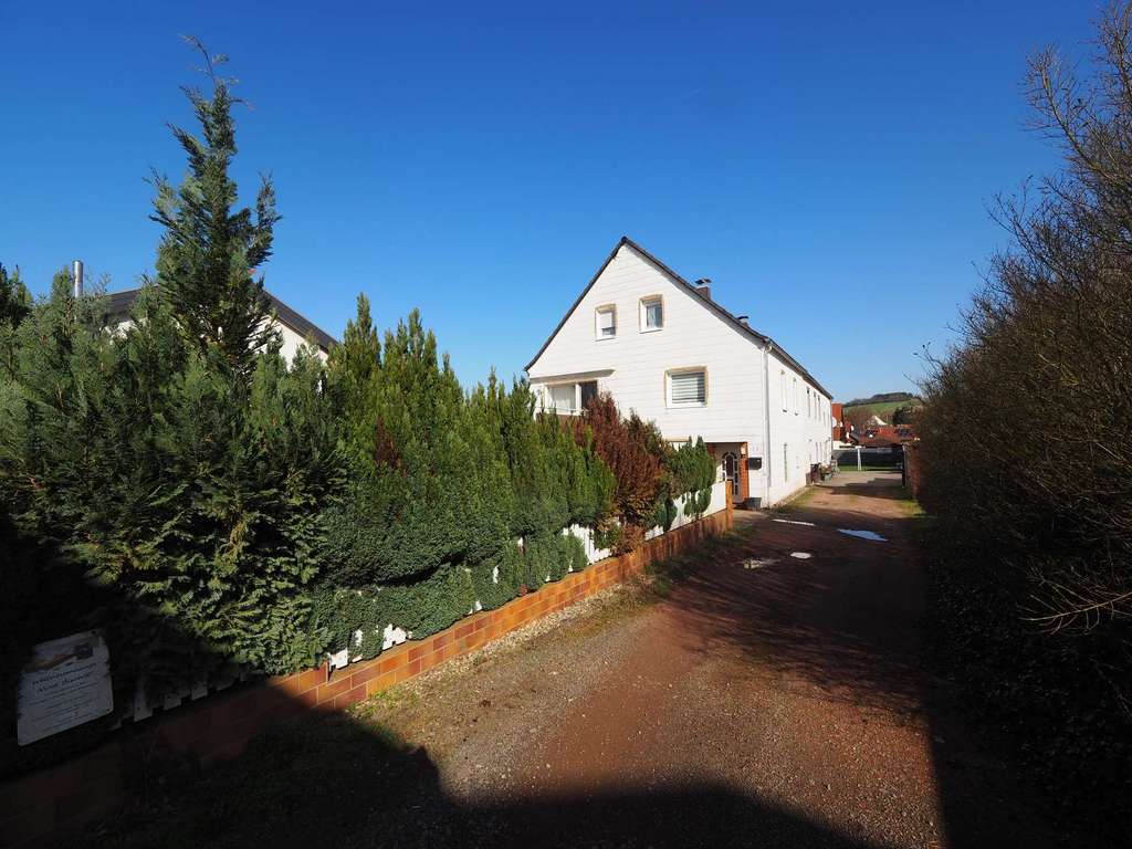 Immobilie in Zweibrücken - GÜNSTIGES EINFAMILIENHAUS MIT GARAGE IN ZWEIBRÜCKEN-RIMSCHWEILER - Bild 2