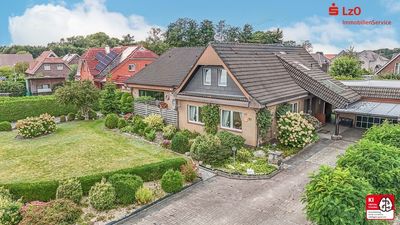 Doppelhaus mit schönem Garten und zwei Auffahrten