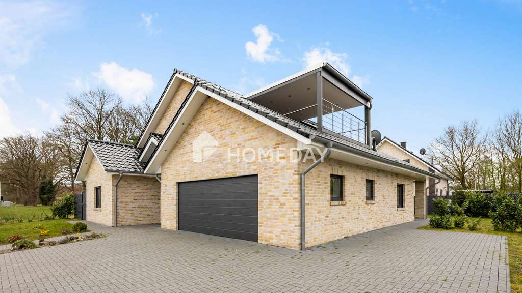 Immobilie in Herzlake - Modernes Einfamilienhaus mit Solar, Fußbodenheizung, Doppelgarage und Gartenidylle - Bild 1