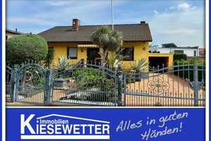 Bungalow in der Karl-Marx-Siedlung mit Kamin, Doppelgarage und Wintergarten – Worms – Vorschaubild 1