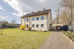 Zweifamilienhaus mit Baugrundstück und wohnlich ausgebautem Dachboden in Trappenkamp – Die vollständige Adresse der Immobilie erhältst du vom Anbieter., 24610 Trappenkamp – Vorschaubild 1