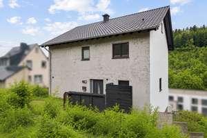 Wohnen mit Traumaussicht – Ihr modernes KfW 55 Haus mit großem Garten und viel Platz in Waldrach