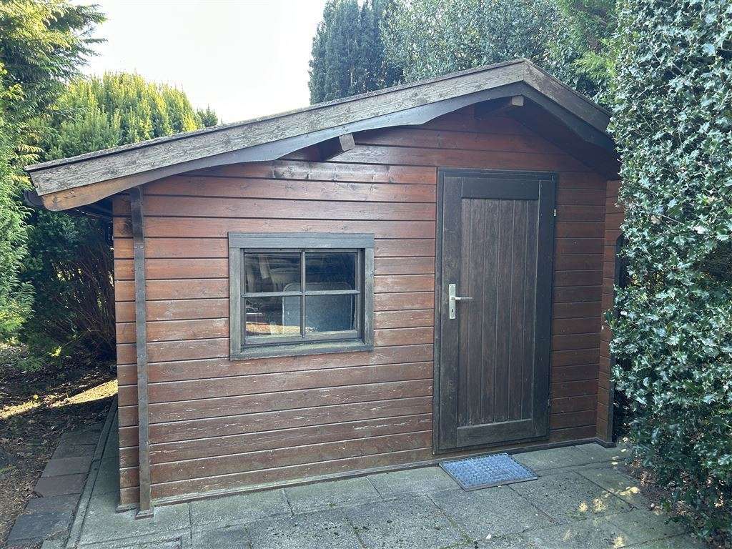 Immobilie in Steyerberg - Charmantes Blockbohlenhaus mit Sonnenterrasse mit tollem Weitblick u. einer beheizbaren Vollkeller. - Bild 3