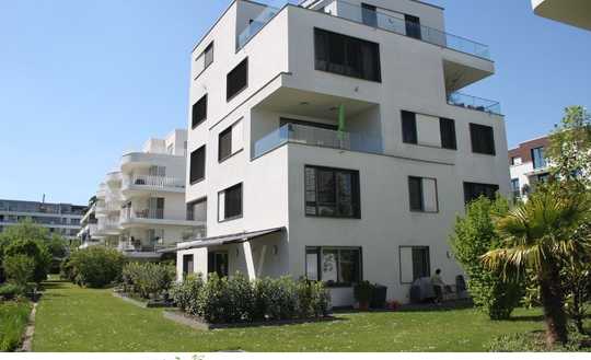 Traumhafte Erdgeschoss Terrassen Wohnung mit seitlichem Rheinblick
