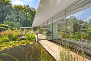 Architektenbungalow mit ikonischer Architektur und einzigartigem Naturschutzblick – Die vollständige Adresse der Immobilie erhältst du vom Anbieter., 22359 Volksdorf, Hamburg – Vorschaubild 9
