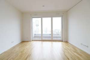 Sonnenverwöhnte 2-Zi-Wohnung mit Balkon, offener Markenküche und Tiefgaragenstellplatz