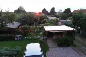 Haus mit vermieteter Einliegerwohnung und großem Garten mit traumhaften Sonnenuntergängen