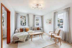 Renovierte Erdgeschosswohnung mit Terrasse