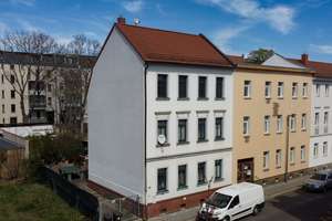 Mehrfamilienhaus mit drei Wohneinheiten und zusätzlichem Bebauungspotenzial