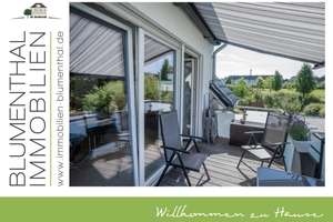 Neuwertige Maisonettewohnung mit Sonnenbalkon, Blick ins Grüne und energieeffizienter Ausstattung
