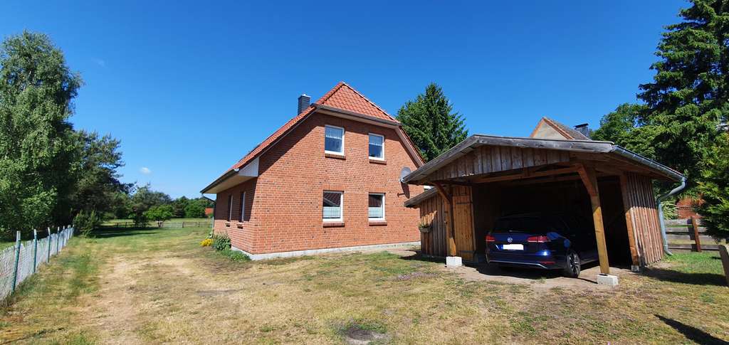 Immobilie in Dömitz - Neuwertiges EFH mit Wärmepumpe, Carport, 2 Bädern, EBK und eigenes Grünland - Bild 0