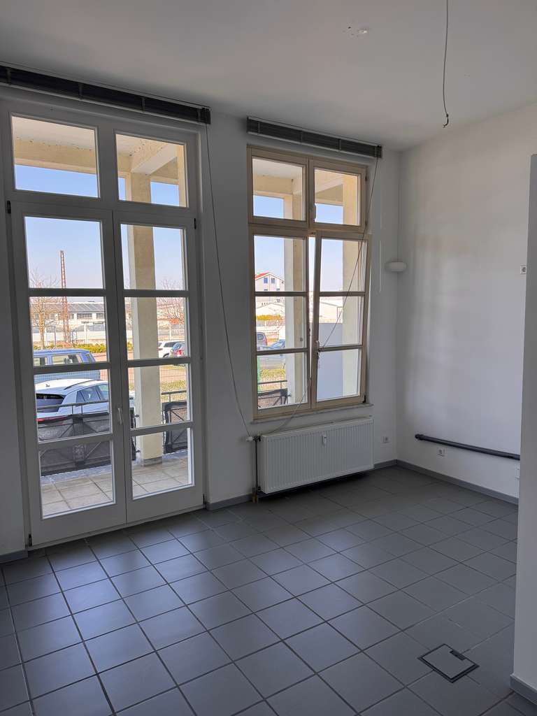 Immobilie in Muggensturm - 3-Zimmer-Hochparterre-Wohnung mit Balkon - Bild 1